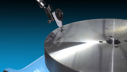 A sensor analyzing the flatness of a rotary grinding table
