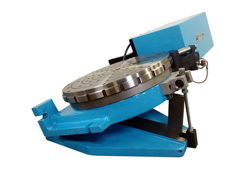 A rotary grinding table machine with angled sine table