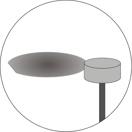 Illustration of a jig grinder milling the outside diameter of a newley cut computer disc wafer