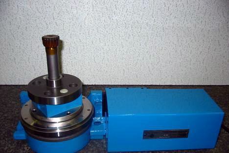 A rotary grinding table made for shank-type cutters